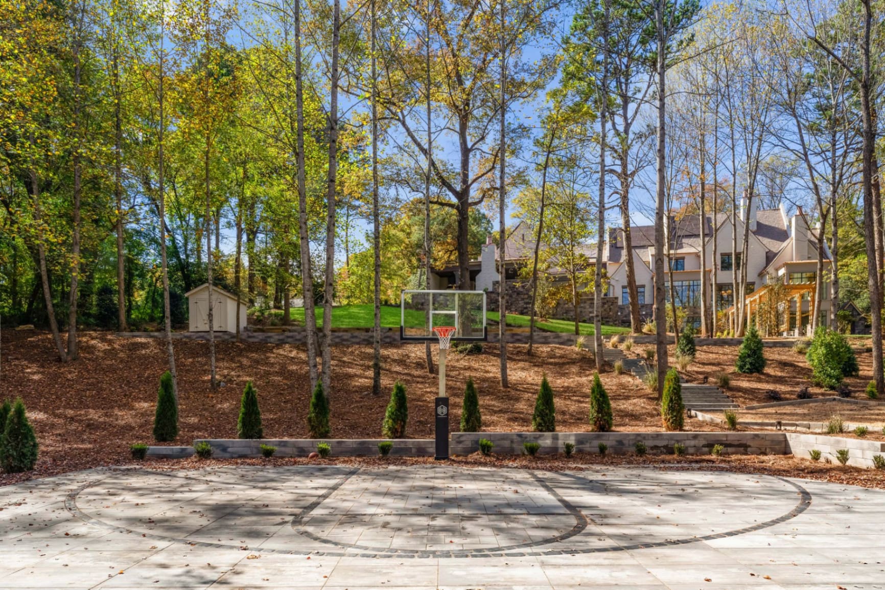 Court nestled in wooded grounds
