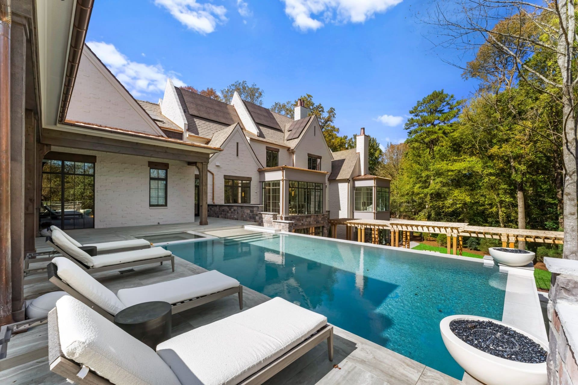 Pool and estate rear view in daylight