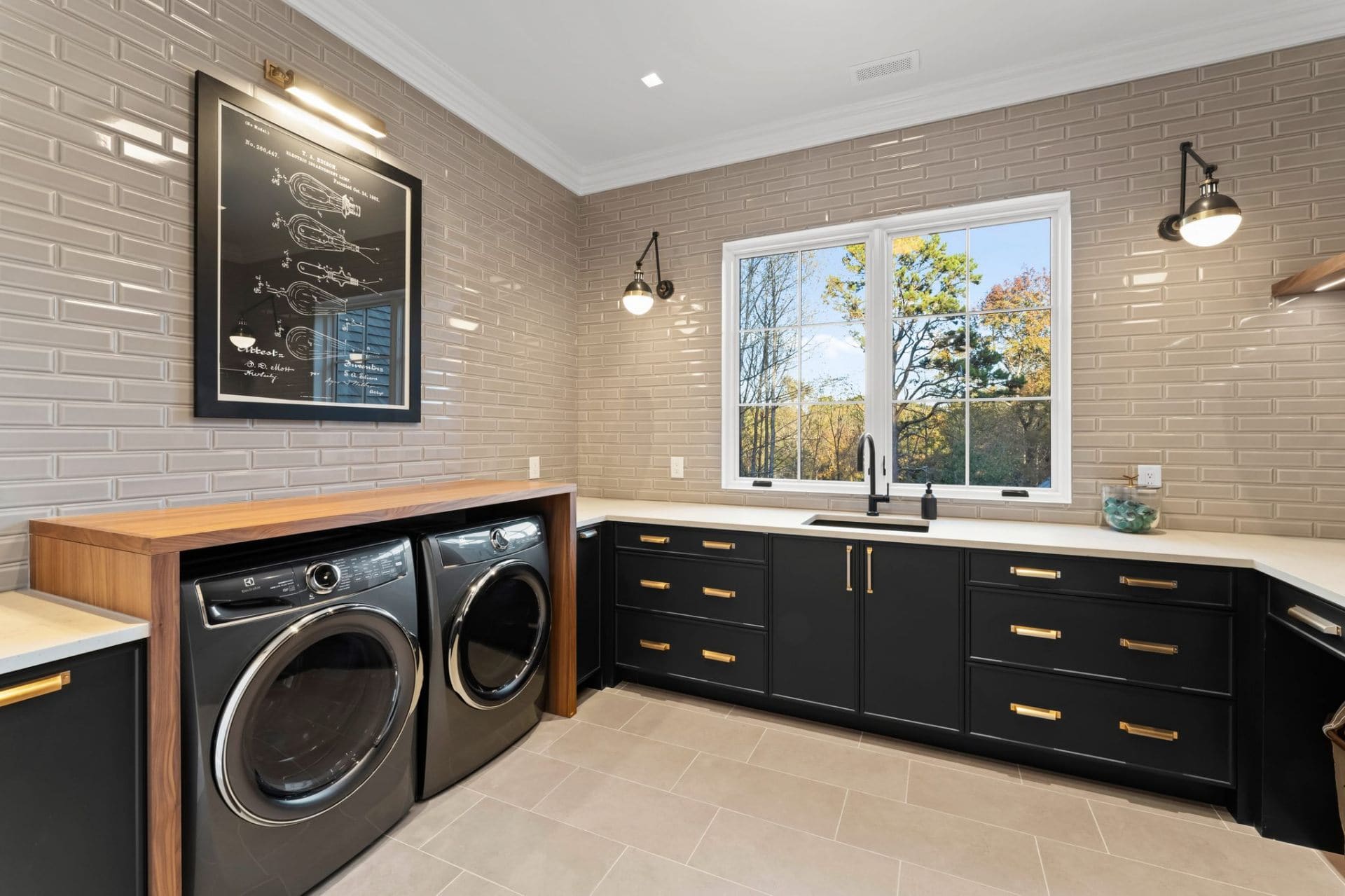 Laundry room with walnut surround and brass hardware