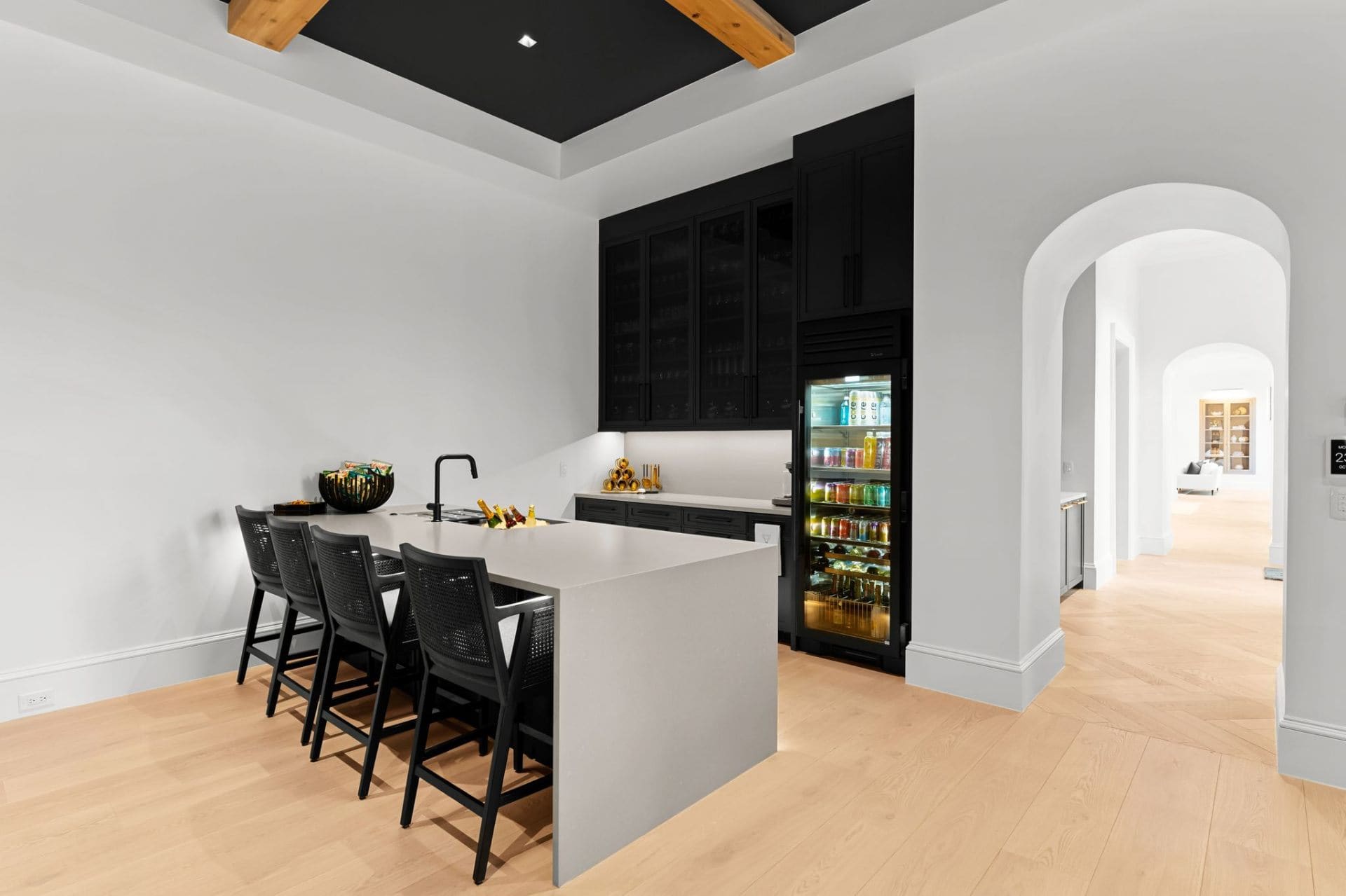 Lower level bar with beverage fridge