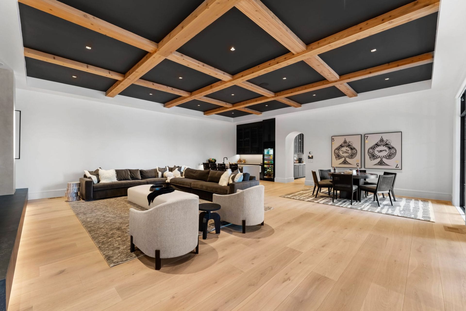 Lower level lounge with timber beams and card table