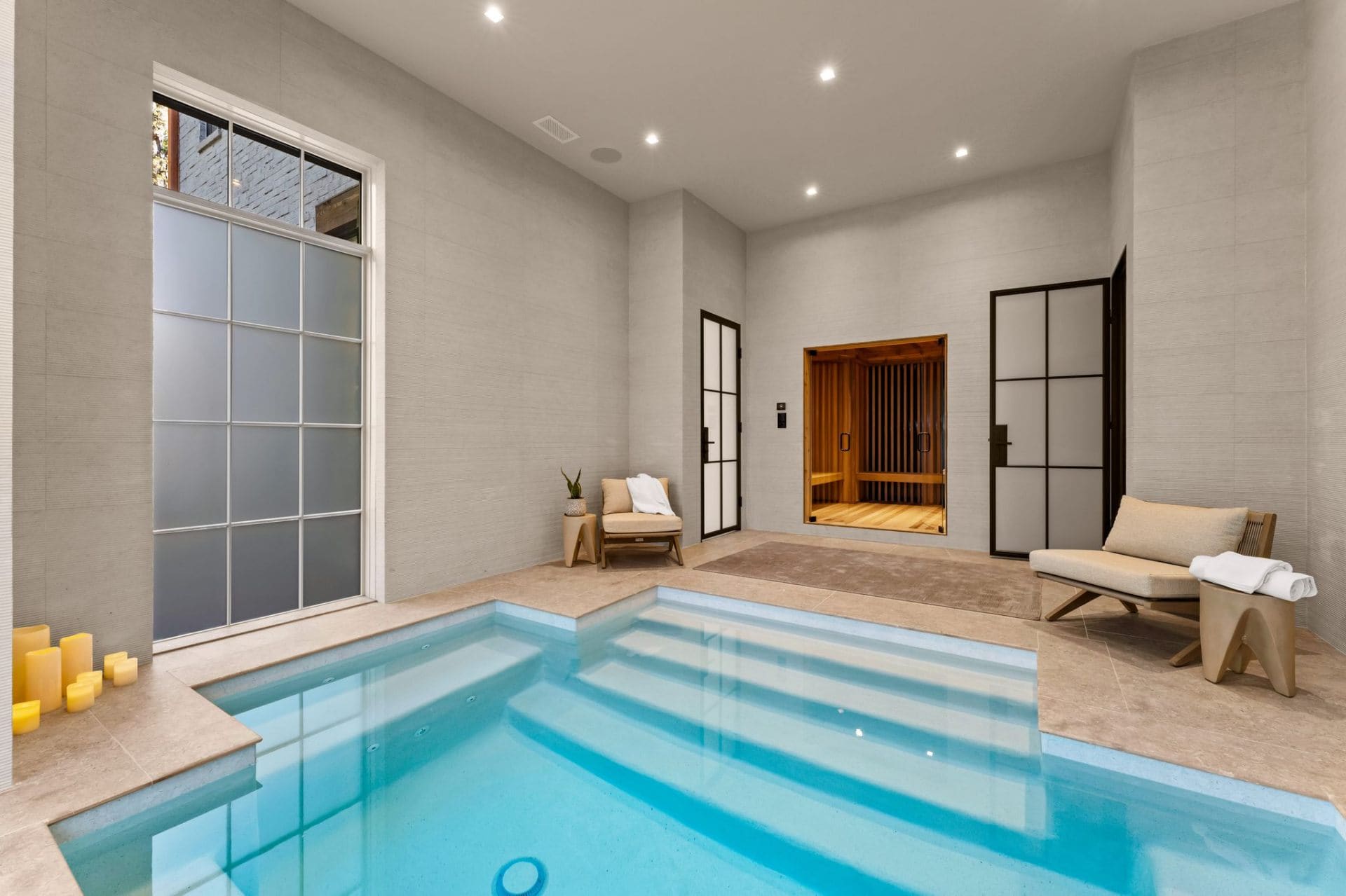 Indoor pool with sauna view