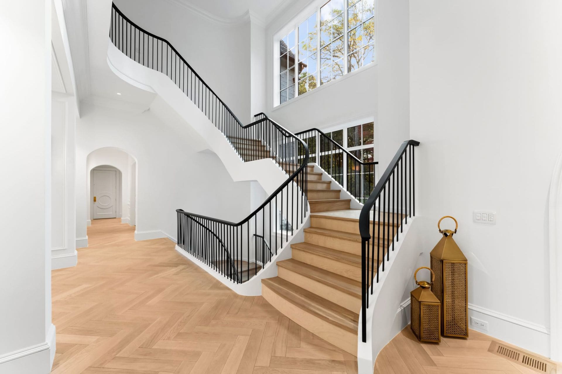 Staircase detail with brass lanterns